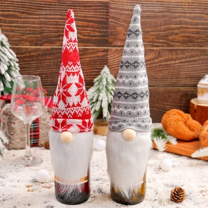 Christmas gnome wine bottle covers with knitted hats and long beards for holiday table decor