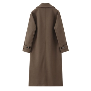 Detail view of the back seam and adjustable cuffs on this dark brown wool coat