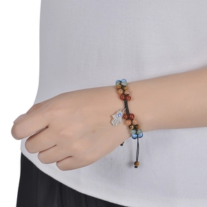 Hamsa Hand beaded bracelet with colorful natural stones and evil eye charms on wrist
