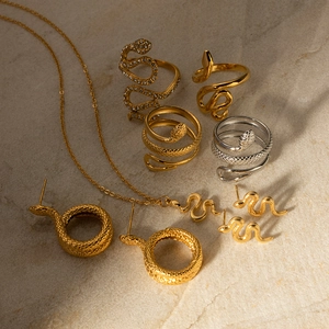 Elegant 18K gold plated stainless steel snake jewelry set with sparkling rhinestones