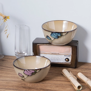 Retro Japanese ceramic bowls with floral patterns set of 2 in a warm home still life setting