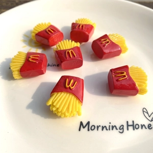 Miniature resin French fry charms with iconic red packaging and M logo for DIY crafts