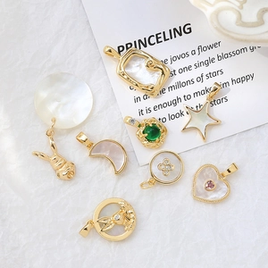 Gold-plated brass shell pendants in heart, star, and moon shapes for DIY jewelry making