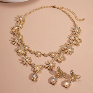 Retro gold flower and butterfly jewelry set with pearls and teardrop crystals
