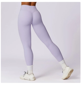 Close-up of lavender high-waisted yoga pants with butt-lifting fit and seamless knit fabric
