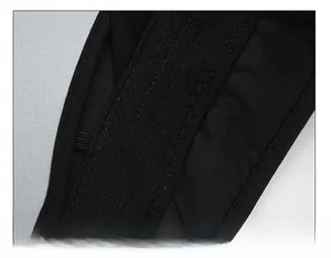 Detail of wide thickened sweatband and fine stitching on a black sun visor hat