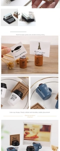 Macro shot of creative wooden coffee cup and typewriter memo clip photo holders