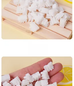 Macro detail of miniature PVC imitation squid food charms for DIY dollhouse decoration