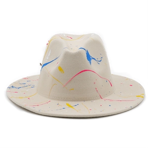 Artistic cream wool fedora hat featuring colorful paint splatter graffiti and classic crown