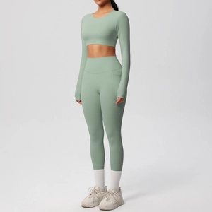 Detail of high-stretch sage green yoga set showing side profile and ribbed texture