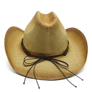 Detail of straw cowboy hat featuring natural weave and leather band with side-curled brim