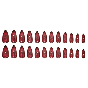 Dark red gradient stiletto press-on nails with spider web patterns and subtle glitter
