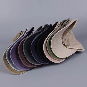 Selection of multi-color cotton baseball caps showing 10 different shades and curved brims