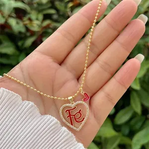 Collana a catena con sfere placcata oro 18K con doppio ciondolo a cuore e zirconi