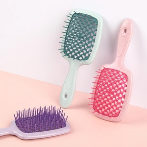 Vented detangling hair brush with hollow honeycomb design in green pink and purple colors