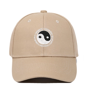 Close-up of Tai Chi embroidery and Swimming text on khaki cotton baseball cap