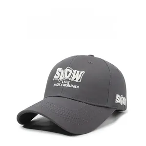 Detailed view of white 'SLOW LIFE' 3D embroidery on dark grey cotton baseball cap