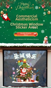 Detail of Christmas window decals featuring Santa, reindeer, and festive tree decorations