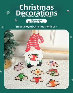 Close-up of wooden Christmas gnome ornament with various interchangeable holiday icons