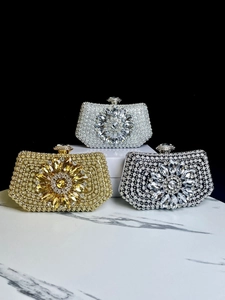 Luxe rhinestone evening clutch bag with sparkling flower pattern in silver and gold