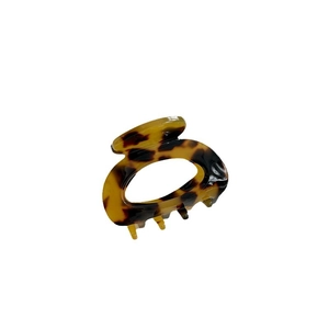 Elegant tortoise shell acetate hair claw clip with minimalist oval hollow design