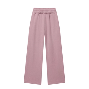 Vue détaillée de la taille élastique d'un pantalon en maille rose poudré à jambes larges