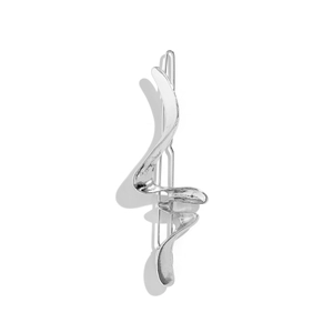Detail showing wavy irregular silver metal hair clip with a polished finish on white backdrop