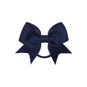 Detailed view of navy blue grosgrain ribbon bow with a textured ribbed surface finish