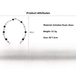 Detail of beaded necklace showing faux pearls and glass beads with 46cm length dimensions