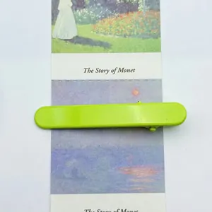 Detail view of 6cm bright green seamless metal duckbill hair clip for DIY craft