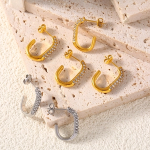 Elegant U-shaped titanium steel earrings with cubic zirconia in gold and silver finish