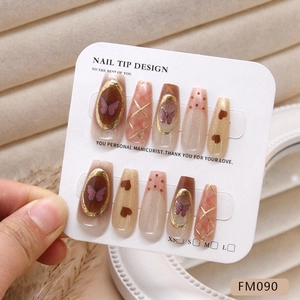 Faux ongles ballerine faits main avec motifs papillon 3D cœur et effet œil de chat chic