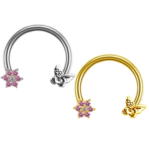 Silver and gold butterfly horseshoe nose rings with pink gemstone flowers on white background