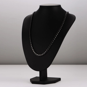 Minimalist black stainless steel square link chain necklace for men on black bust