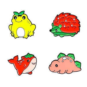 Cute enamel pin set featuring a lemon frog, strawberry hedgehog, whale, and pink dinosaur