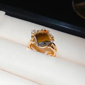 Gold snake-style open ring with square tiger eye stone, zircons and white pearls