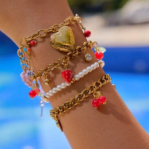 Layered 18K gold-plated stainless steel bracelet with cherry, strawberry and heart charms