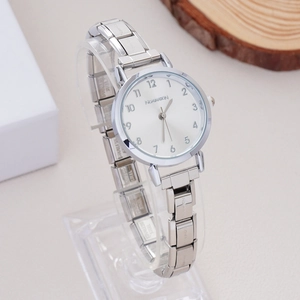 Silver stainless steel rhinestone stretch watch for women with Nomination branding