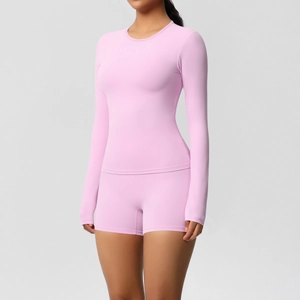 Close-up of pink long sleeve yoga set featuring high-elasticity fabric and slim fit design