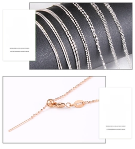 Detail of adjustable stainless steel snake and ball chains in silver and rose gold