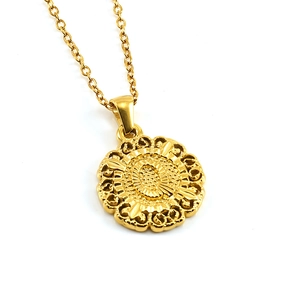 Detailed close-up of 18k gold-plated stainless steel necklace with sunburst relief pendant