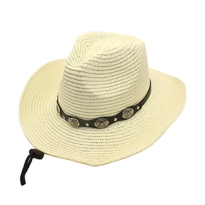 Detail of straw cowboy hat with black leather band, metal buckles and adjustable chin strap