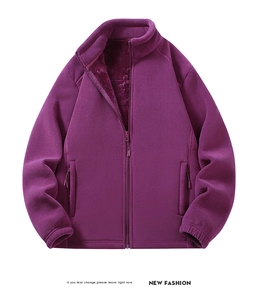 Detail of purple polar fleece jacket showing warm plush lining and zipper pocket