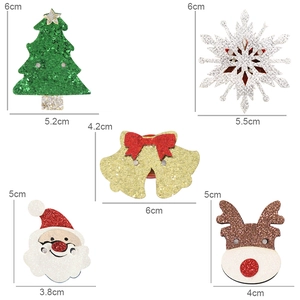 Collection of glittery cartoon Christmas pins featuring Santa, reindeer and snowflakes