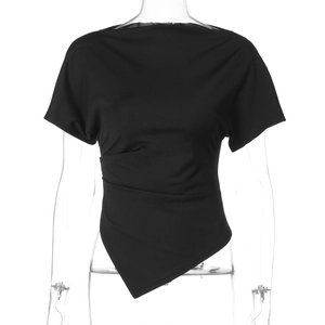 Detail of black slim fit short sleeve top with asymmetric hem and ruched waist details