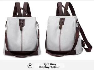 Front and side view of light gray PU leather backpack with contrasting brown straps and zippers