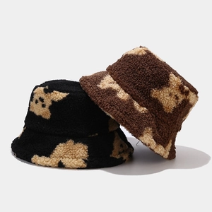 Winter lamb wool bucket hat for women with cute bear pattern in black and brown