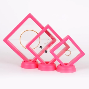 Rose pink PE film floating jewelry display boxes in three sizes with base stands