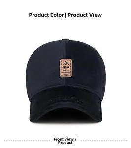 Detailed macro of the mountain sport leather patch on a black textured winter baseball cap