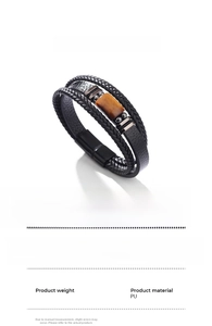 Detail of multi-layer leather men's bracelet with tiger eye stone and magnetic clasp